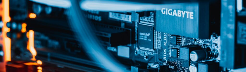 a close up of a computer motherboard with wires