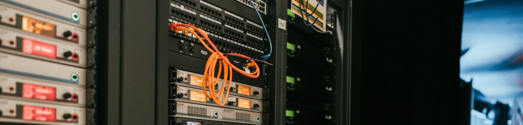 a rack of servers in a server room
