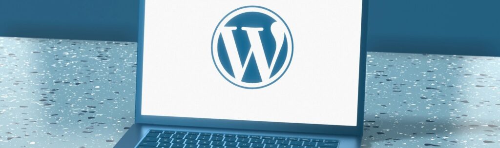 a laptop computer sitting on top of a table