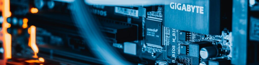 a close up of a computer motherboard with wires