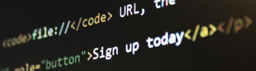 Detailed view of HTML and CSS code on a computer screen, concept of programming.